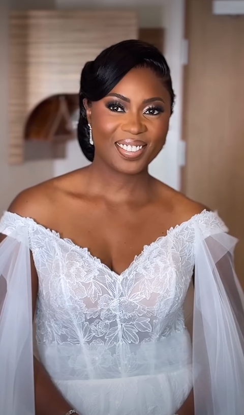 Soft side-part bun hairstyle for an elegant old money wedding look