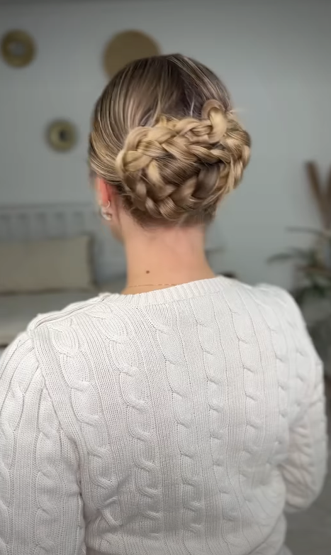 Braided low bun hairstyle for an elegant old money look