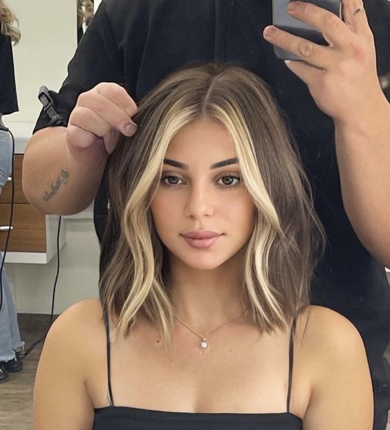 Medium hair with money piece layers for chubby faces