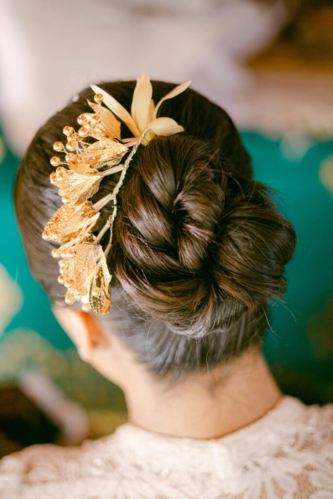 Classic chignon bun hairstyle with a smooth low bun and elegant formal finish