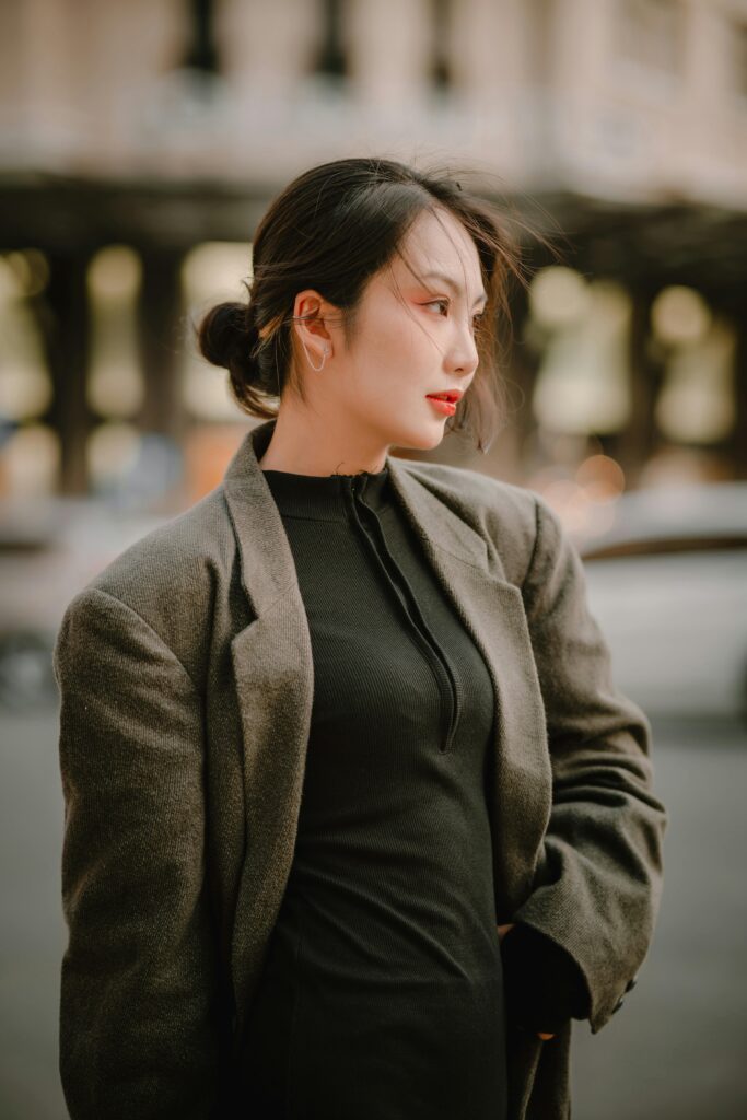 Old money bun with face-framing pieces for a soft and elegant look