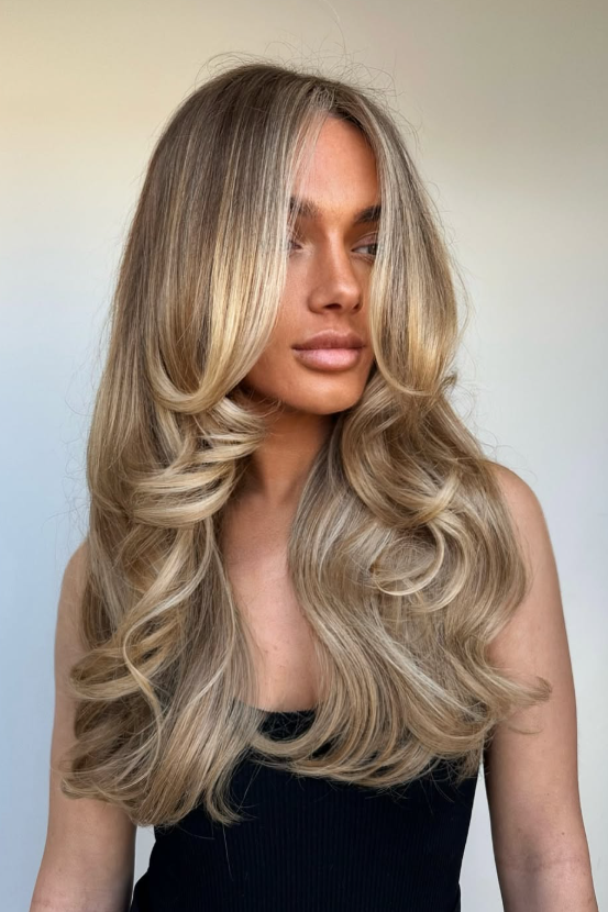 Champagne butter blonde is a soft, luxurious shade that blends champagne blonde with buttery creamy tones.
