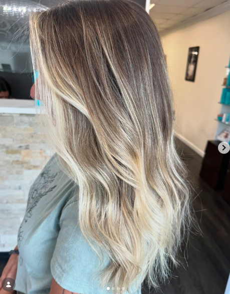 Creamy blonde face-framing highlights are a simple way to brighten your hairstyle. 