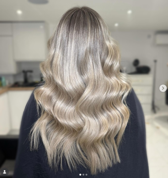 Creamy champagne blonde is a soft and glamorous hair color.