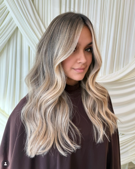 Creamy blonde ombre is a beautiful way to add brightness to darker hair.