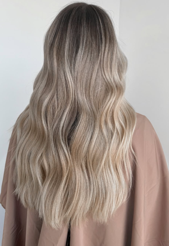 Creamy beige blonde is a balanced and natural-looking blonde shade.