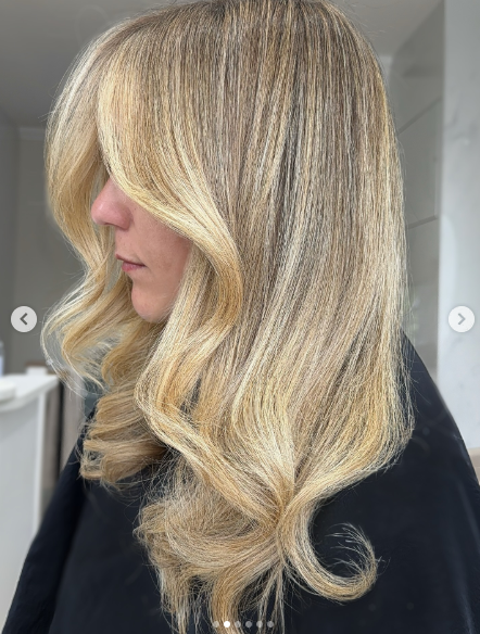 Glossy creamy blonde with soft layers is a polished and elegant hairstyle that gives the hair a smooth, healthy, and radiant finish.