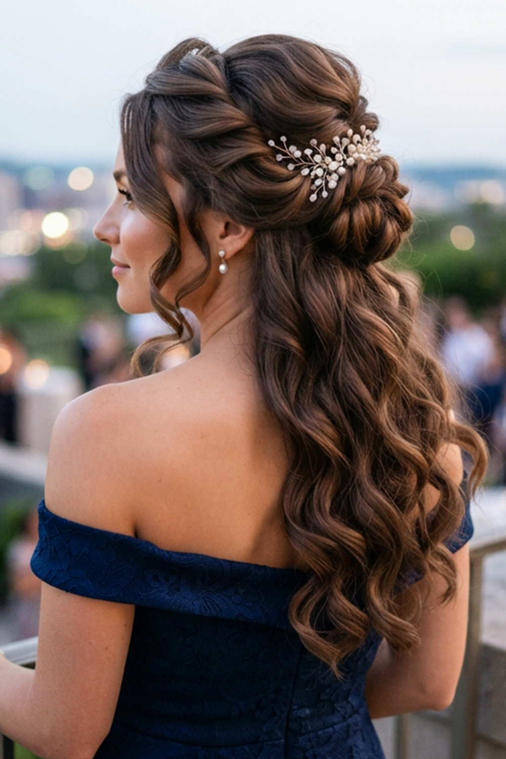The half-up elegant updo suits women who want the beauty of an updo without pulling all their hair back.