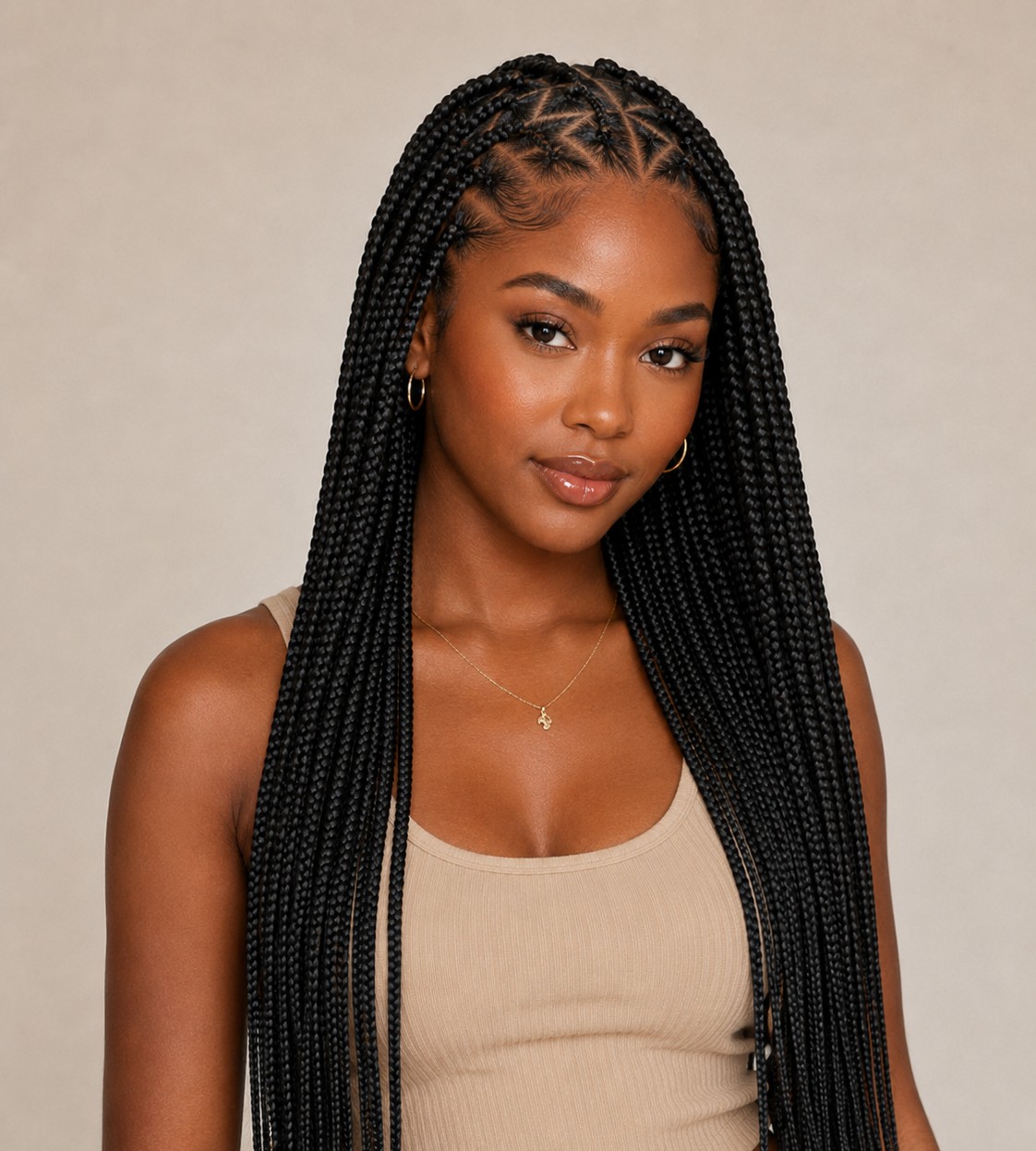 Adding a cornrowed parting design between braided sections creates a decorative, scalp-visible pattern that stands out.
