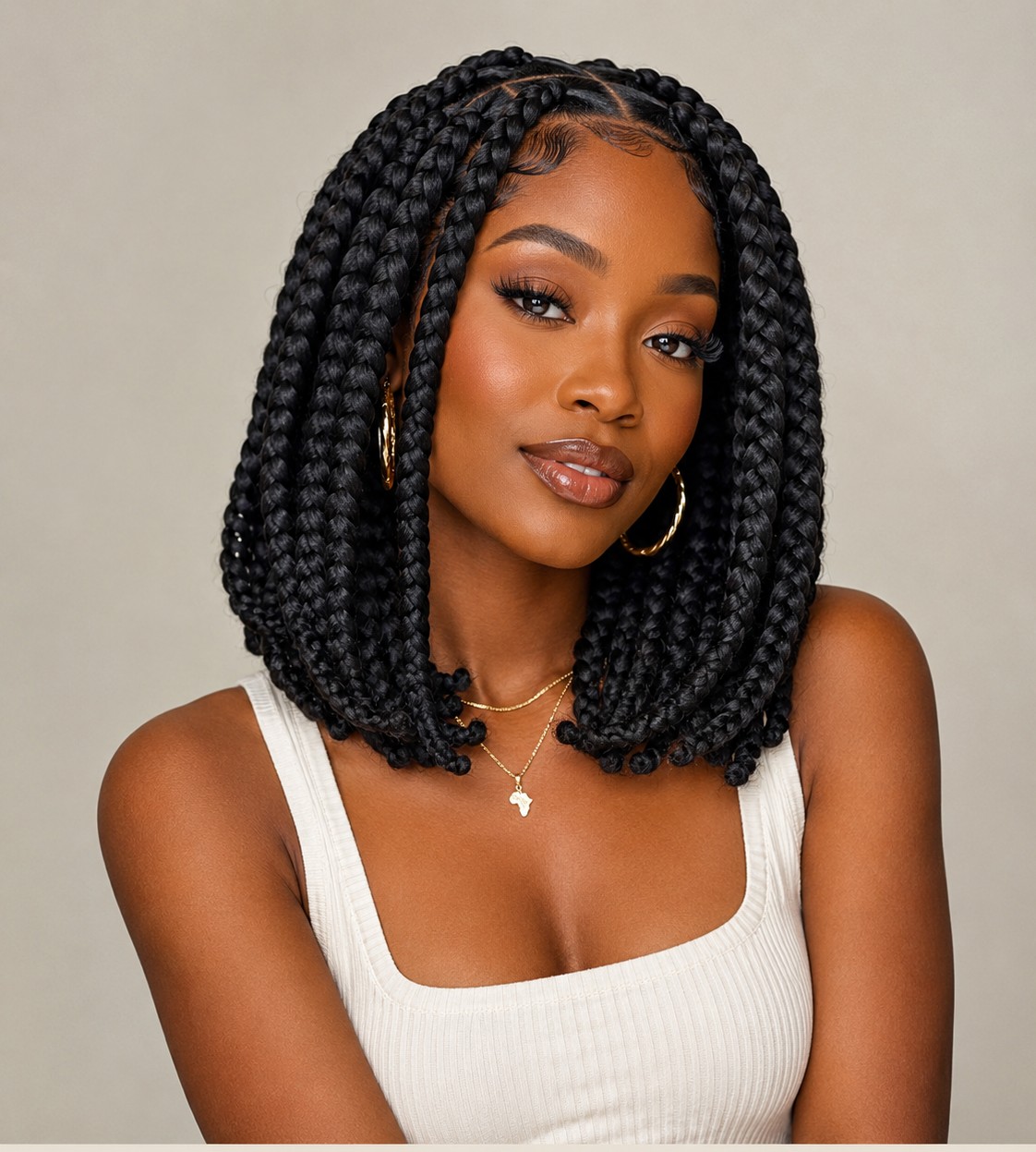 Jumbo knotless braids use larger sections, which means fewer braids overall and a much shorter time in the styling chair.