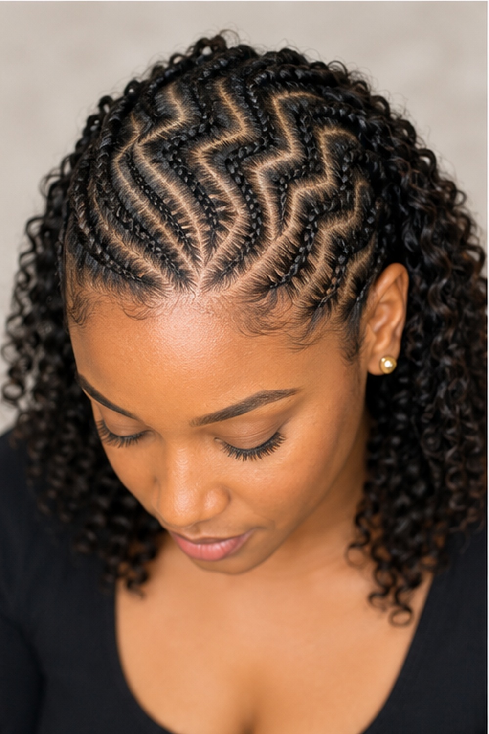 Zigzag partings give braided styles a modern, artistic edge that stands out from traditional straight-part cornrows.