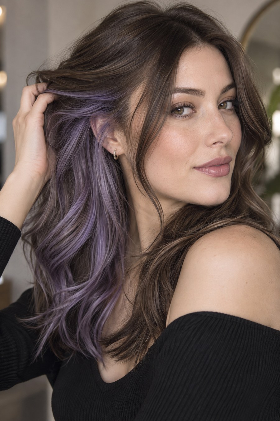 Brunette wavy hair with subtle lavender peekaboo highlights.